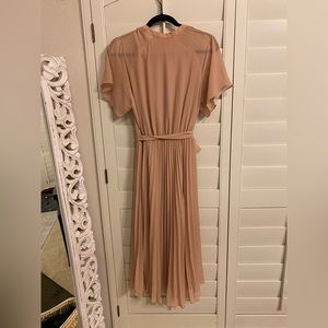 H&M dress. Size Small. Peach Color. New without tags